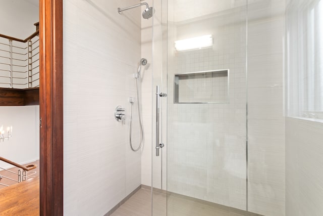 full bathroom with a shower stall