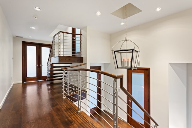 entrance foyer featuring recessed lighting, french doors, baseboards, and wood finished floors