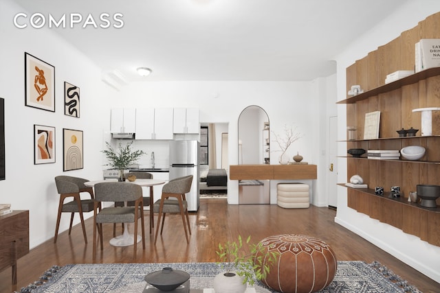 dining area with dark wood-type flooring