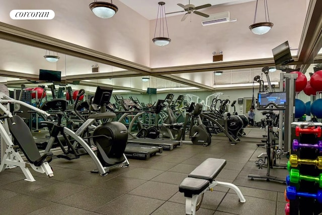 gym with visible vents and a ceiling fan