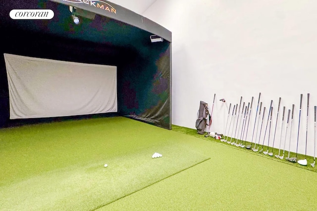 game room featuring carpet flooring and golf simulator