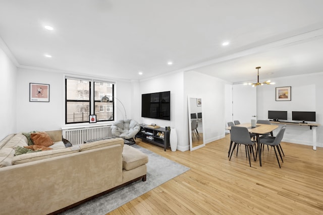 150 E 27th St Unit 4Fg, New York City, NY 10016 - living area with recessed lighting, an inviting chandelier, light wood-style flooring, and crown molding
