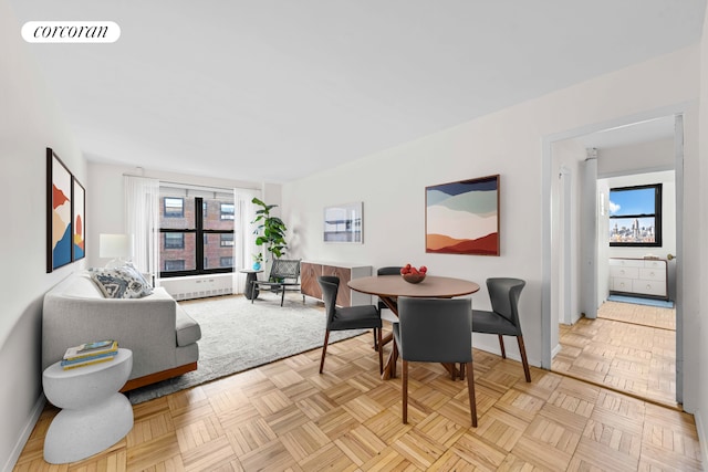 dining space featuring visible vents and baseboards