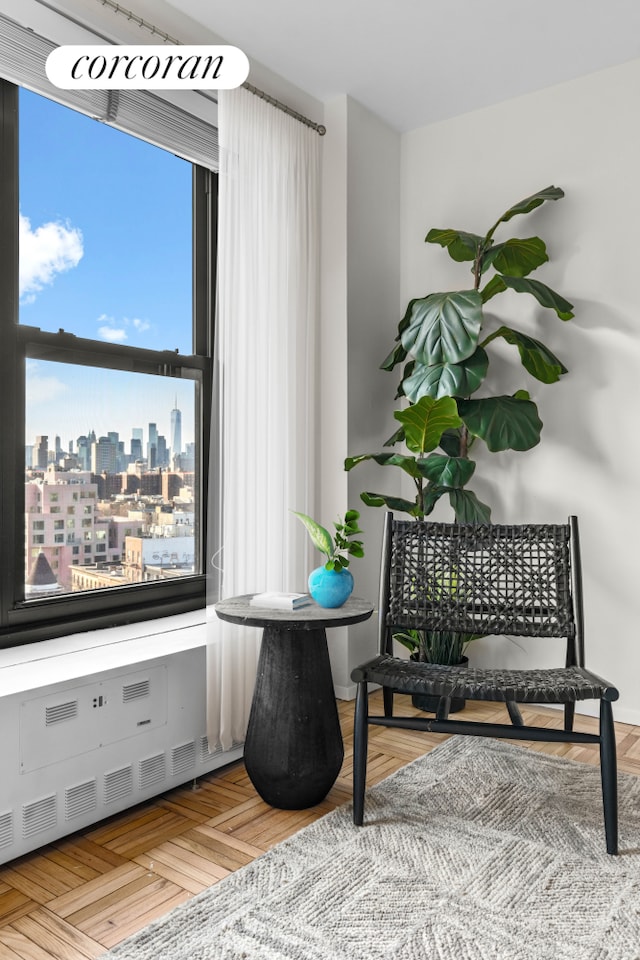 sitting room featuring a city view