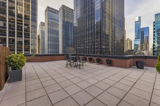 77 W 55th St Unit 7-C, New York City, NY 10019 - view of patio / terrace with a view of skyline