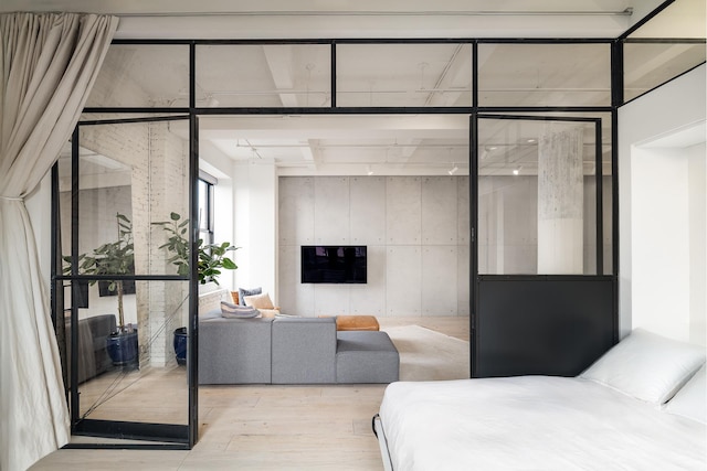 bedroom with wood finished floors