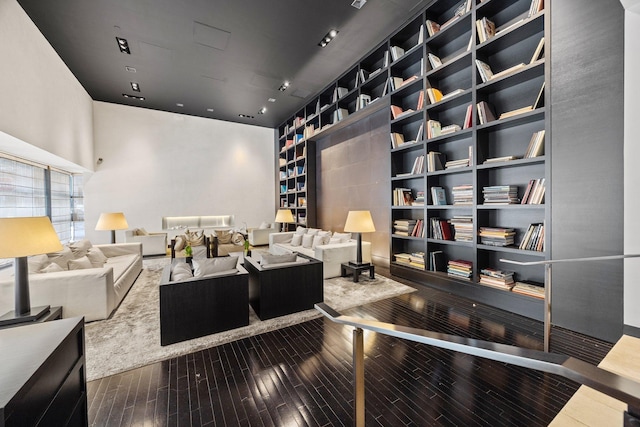 20 Pine St Unit 2907, New York City, NY 10005 - living area featuring hardwood / wood-style flooring and built in features