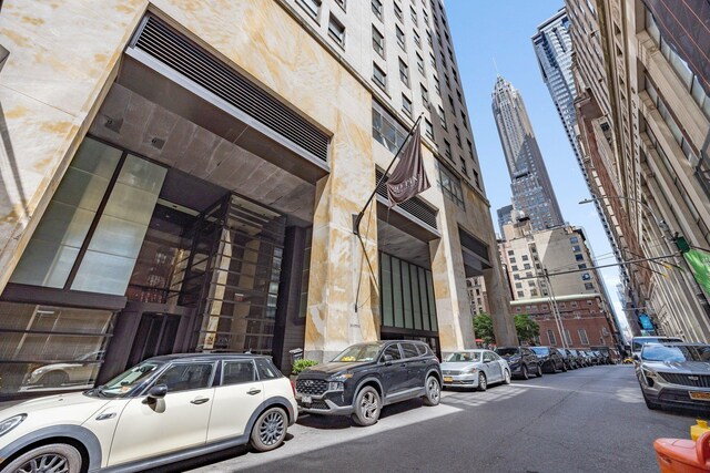 20 Pine St Unit 2907, New York City, NY 10005 - view of building exterior featuring a city view