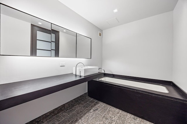 20 Pine St Unit 2907, New York City, NY 10005 - bathroom featuring a garden tub and vanity