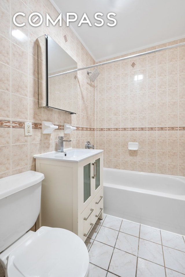 full bath with shower / bath combination, toilet, and tile walls