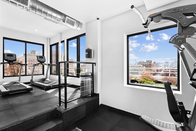 305 2nd Ave Unit 530, New York City, NY 10003 - exercise room with a city view, healthy amount of natural light, and baseboards