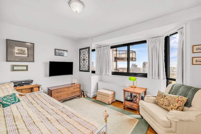1725 York Ave Unit 26E, New York City, NY 10128 - bedroom featuring wood finished floors