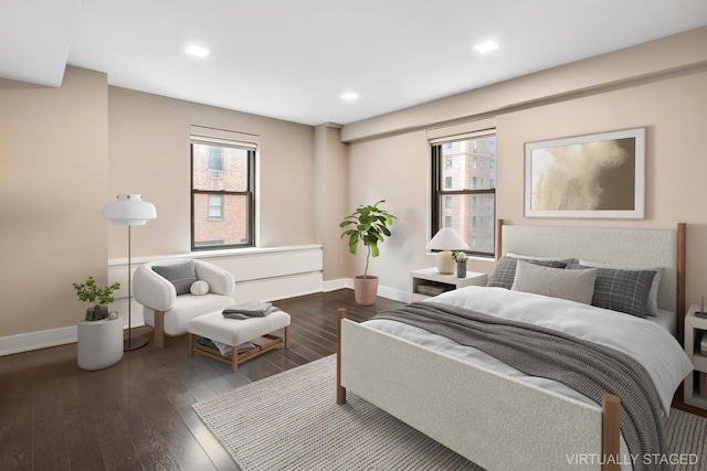 bedroom featuring recessed lighting, wood finished floors, and baseboards