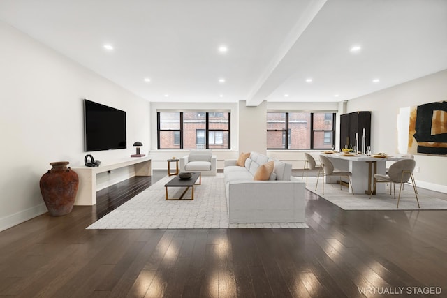 living room featuring recessed lighting, baseboards, and hardwood / wood-style floors