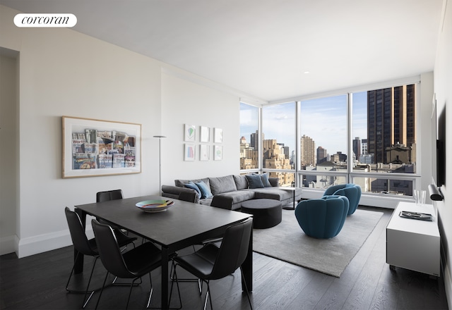 dining space with a wall of windows, dark wood-style floors, visible vents, and baseboards