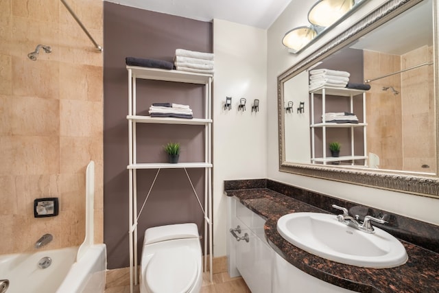 full bathroom with vanity, toilet, and shower / washtub combination