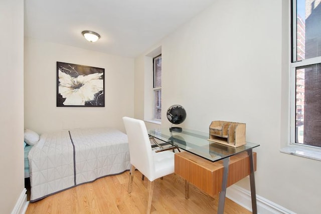 775 Riverside Dr Unit 3D, New York City, NY 10032 - bedroom with baseboards and wood finished floors