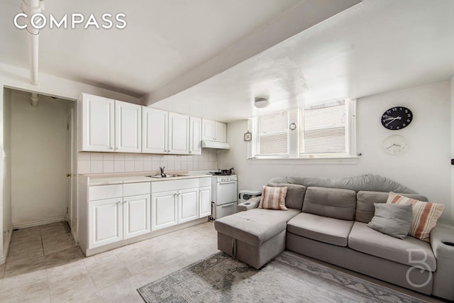 living area with light tile patterned floors