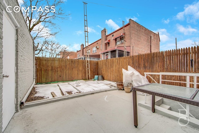 46-10 28th Ave, New York City, NY 11103 - view of patio / terrace with a fenced backyard