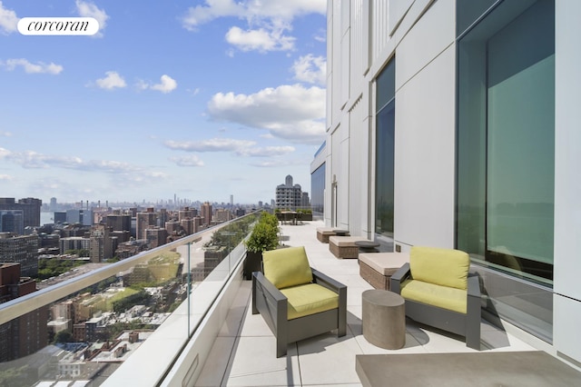 balcony featuring a city view