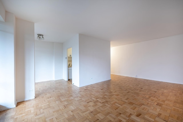 2727 Palisade Ave Unit 9-B, New York City, NY 10463 - spare room featuring baseboards
