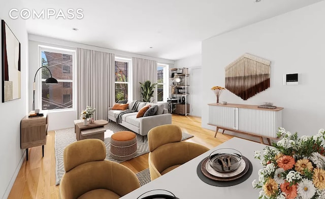 living area with light wood-style floors