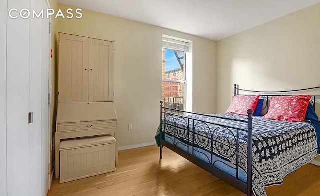 2605 Frederick Douglass Blvd Unit 3B, New York City, NY 10030 - bedroom featuring wood finished floors and baseboards