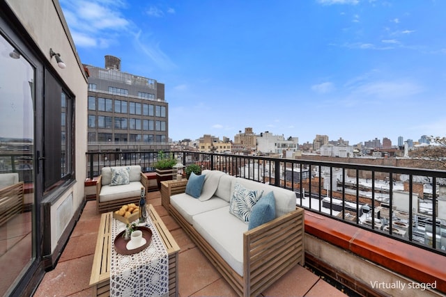 balcony featuring an outdoor hangout area and a view of city