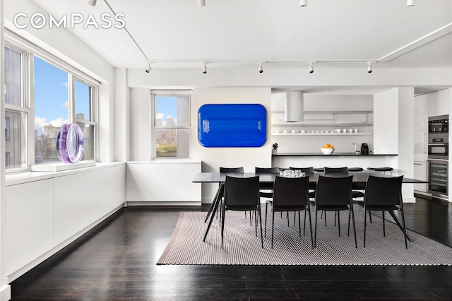 dining room with dark wood-style floors