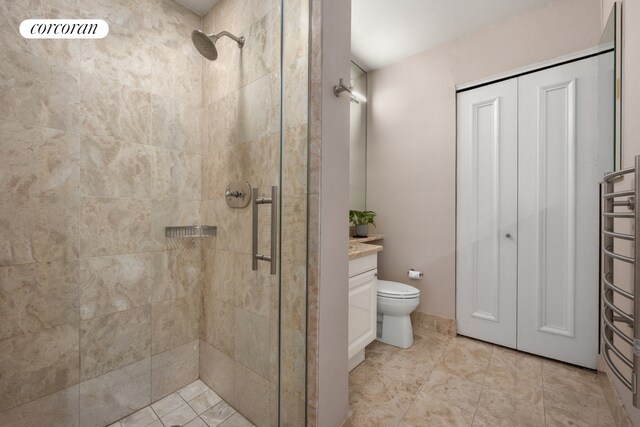 full bath with toilet, a shower stall, radiator, and vanity