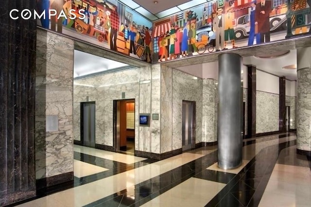 99 John St Unit 1711, New York City, NY 10038 - common area featuring a towering ceiling