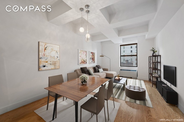 99 John St Unit 1711, New York City, NY 10038 - dining space featuring coffered ceiling, wood finished floors, and beam ceiling