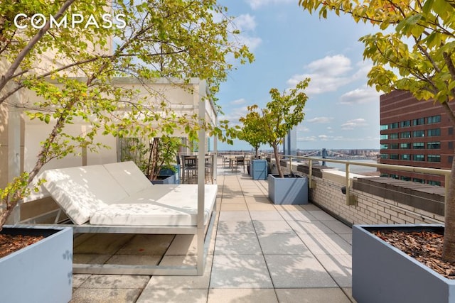 view of patio featuring outdoor dining area