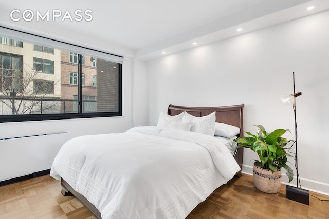 40 E 80th St Unit 2C, New York City, NY 10075 - bedroom featuring recessed lighting and radiator