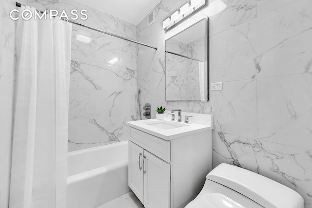 40 E 80th St Unit 2C, New York City, NY 10075 - full bath featuring vanity, shower / tub combo, and tile walls