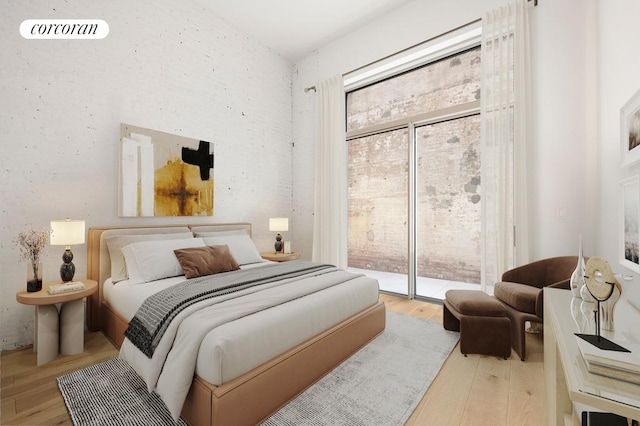 bedroom featuring access to outside, wood finished floors, and visible vents