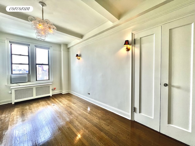 50 W 106th St Unit 15A, New York City, NY 10025 - spare room featuring radiator heating unit, hardwood / wood-style floors, beamed ceiling, baseboards, and visible vents