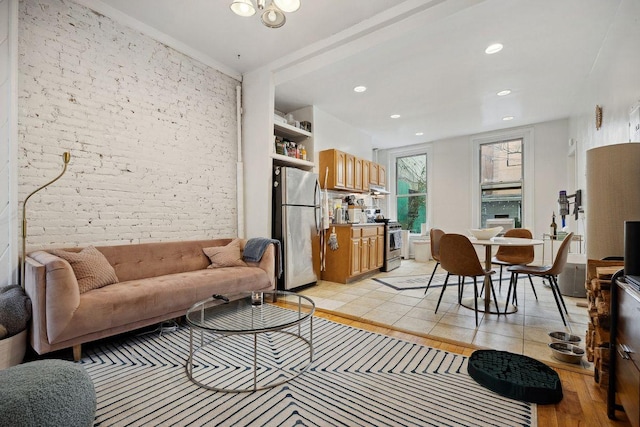 288 Mc Guinness Blvd Unit 1, 2, 3, New York City, NY 11222 - living room with recessed lighting, brick wall, and light wood finished floors