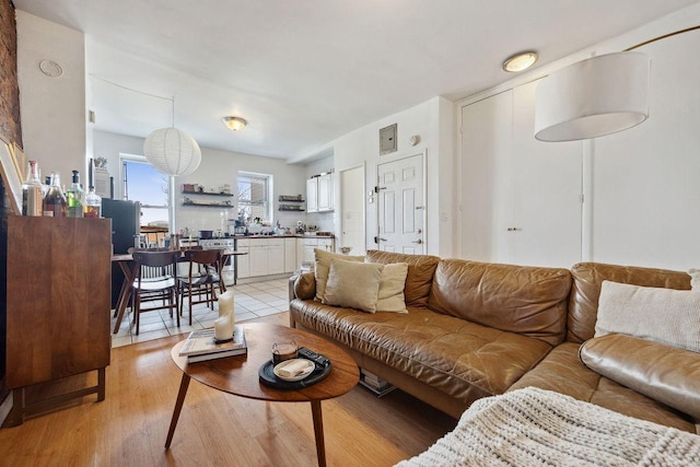 living area featuring light wood-style flooring