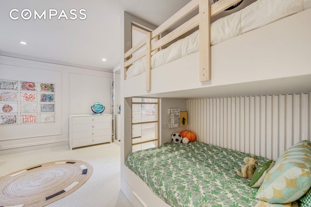bedroom with carpet floors and recessed lighting
