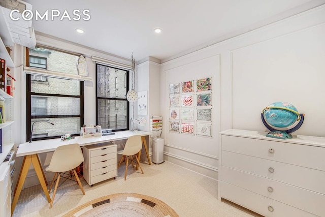 carpeted office with built in desk, baseboards, and recessed lighting