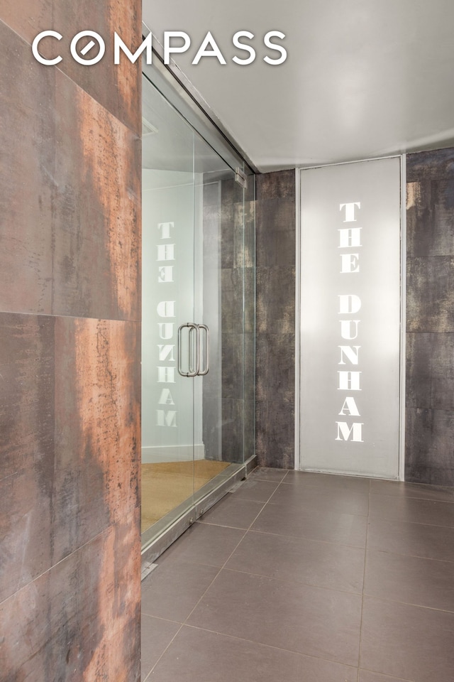 bathroom featuring tile patterned flooring