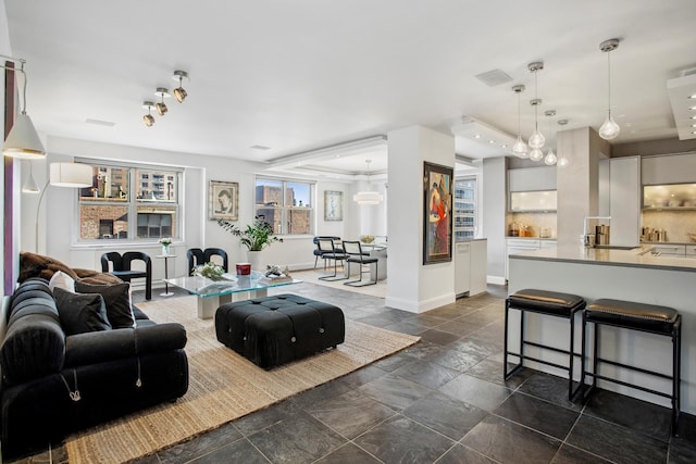 400 E 54th St Unit 19F, New York City, NY 10022 - living area featuring baseboards and stone tile flooring