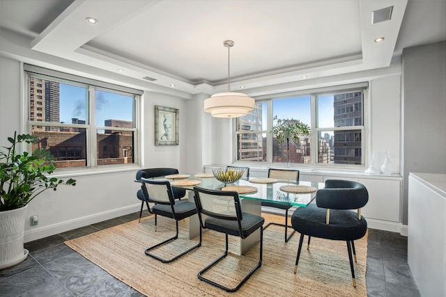 dining area featuring visible vents, recessed lighting, baseboards, and a tray ceiling