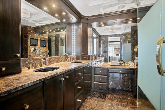 400 E 54th St Unit 19F, New York City, NY 10022 - bathroom with a sink, a raised ceiling, marble finish floor, and crown molding