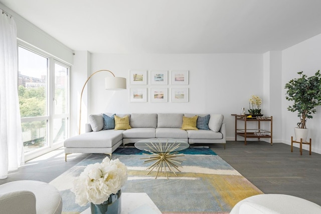 living room with wood finished floors and baseboards