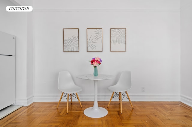 dining room with baseboards and visible vents