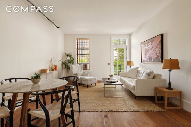 living room with wood finished floors