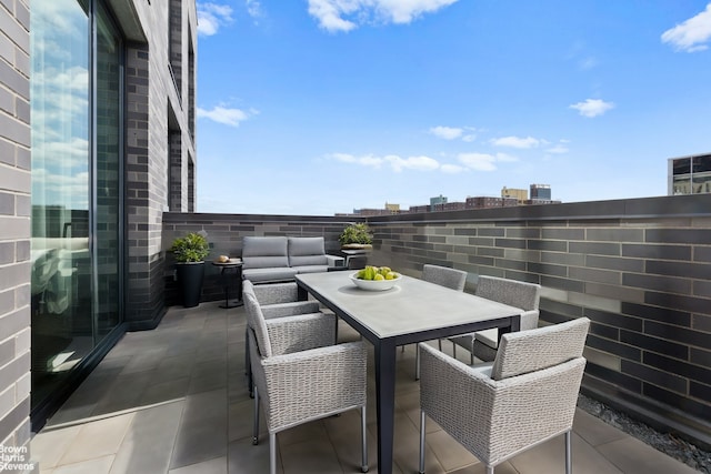 view of patio / terrace featuring outdoor dining space and outdoor lounge area