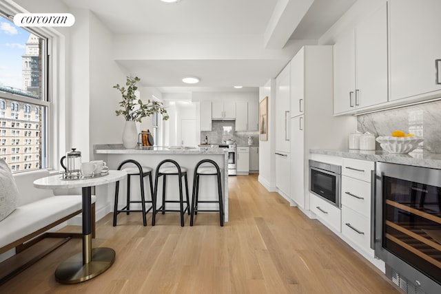 60 Gramercy Park N Unit 16A, New York City, NY 10010 - full bath with toilet, tile walls, vanity, and tiled shower / bath